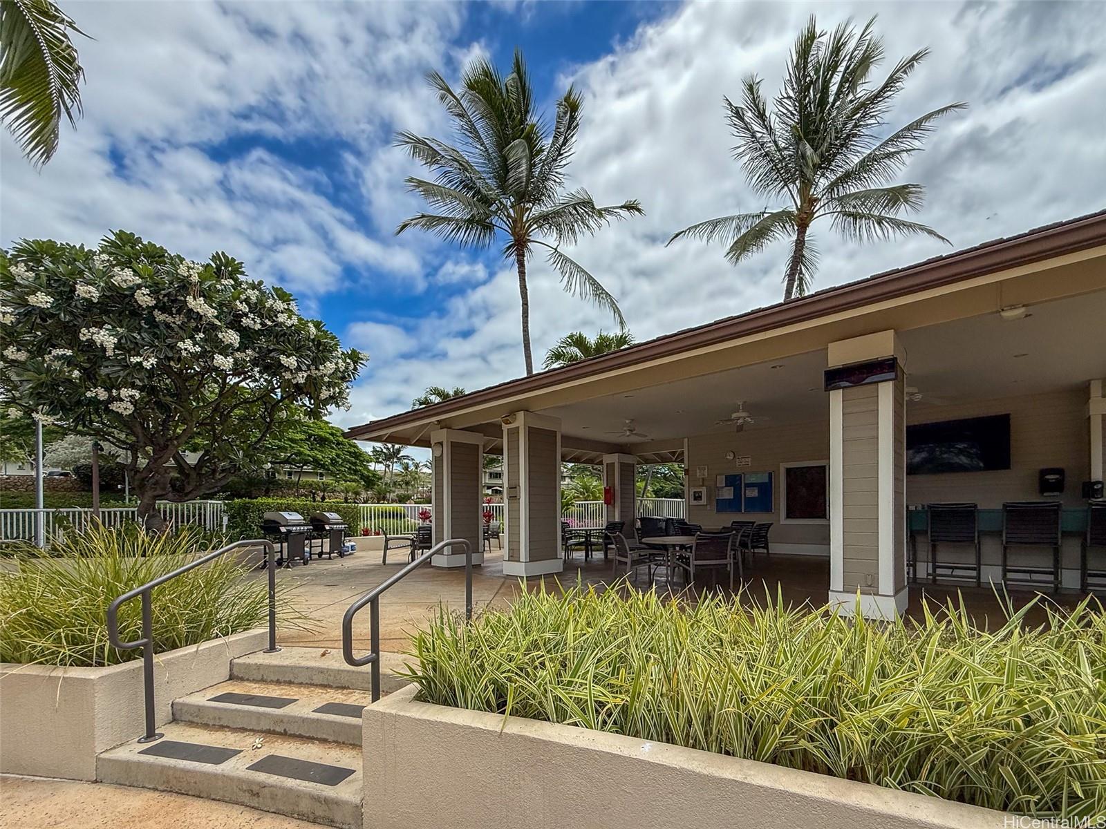 92-1519 Ali'inui Drive, Unit 12A Kapolei, HI 96707 - Photo 17 of 25 a view of house with patio outdoor seating