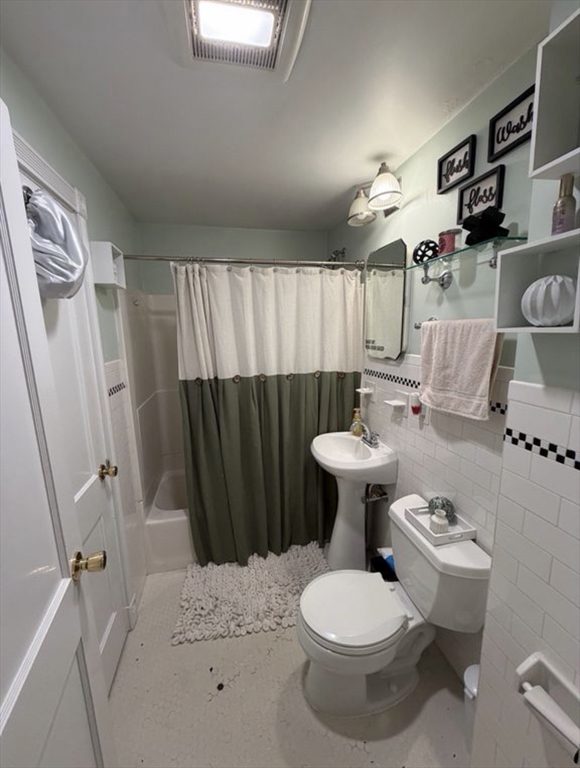 69 Keystone Street, Unit 1 Boston, MA 02132 - Photo 11 of 11 a bathroom with a sink toilet and shower