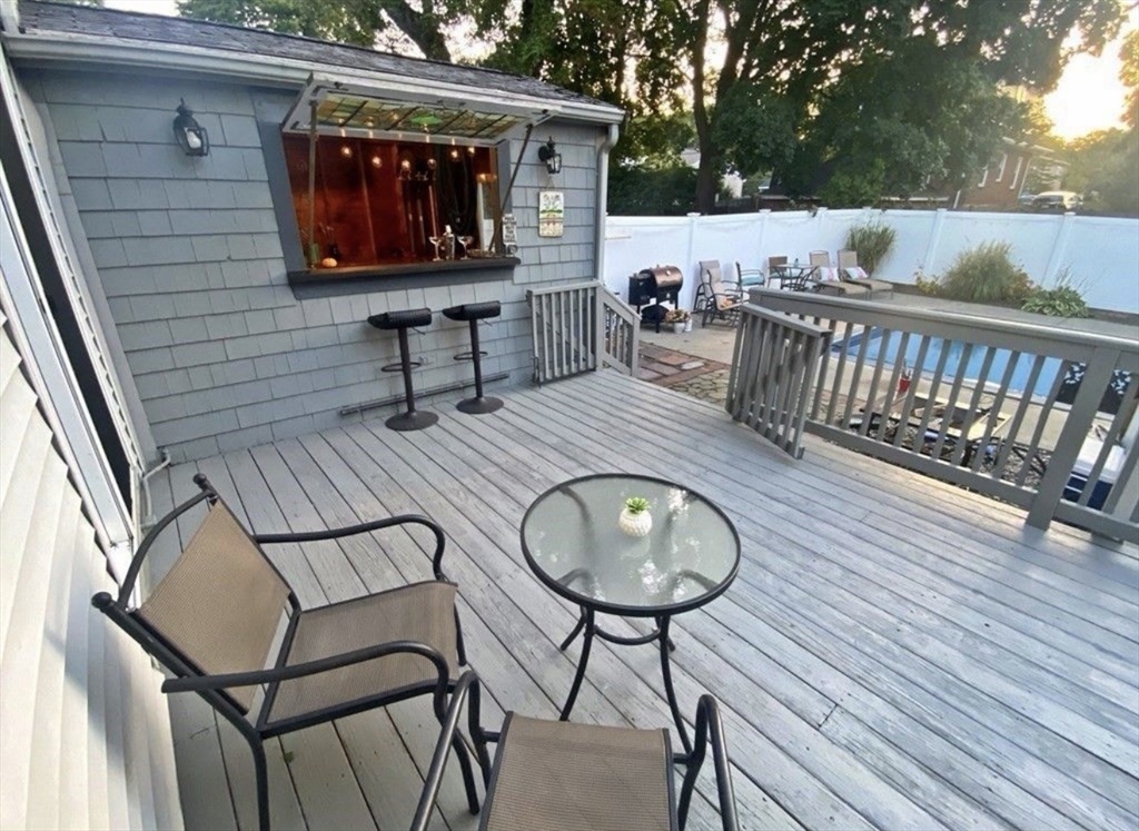 69 Keystone Street, Unit 1 Boston, MA 02132 - Photo 8 of 10 a view of a chairs and tables in the balcony