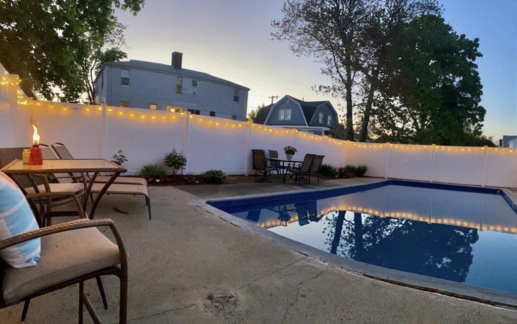 69 Keystone Street, Unit 1 Boston, MA 02132 - Photo 9 of 10 a view of a chairs and table in the patio