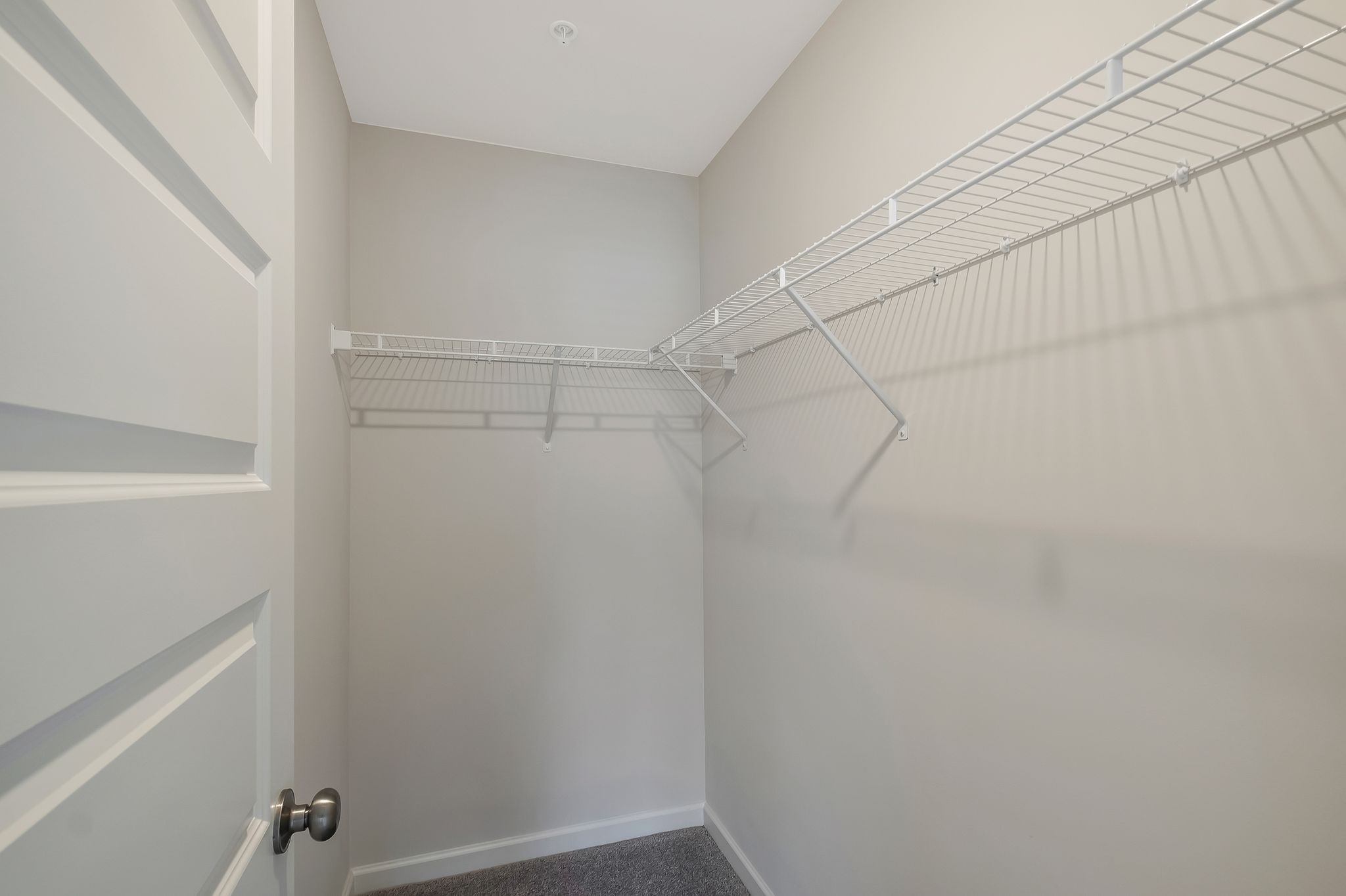419 Alcott Way Spring Hill, TN 37174 - Photo 20 of 25 a view of a room with racks on the wall