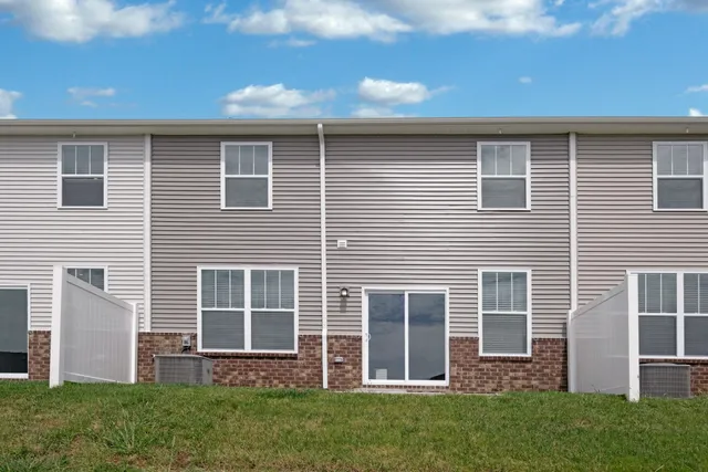 a front view of house with yard