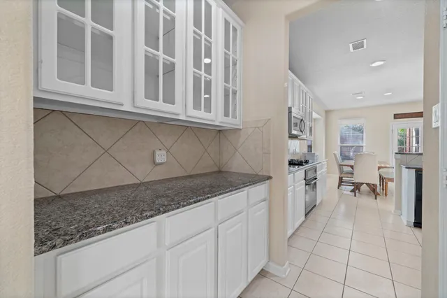 a view of a kitchen with a sink