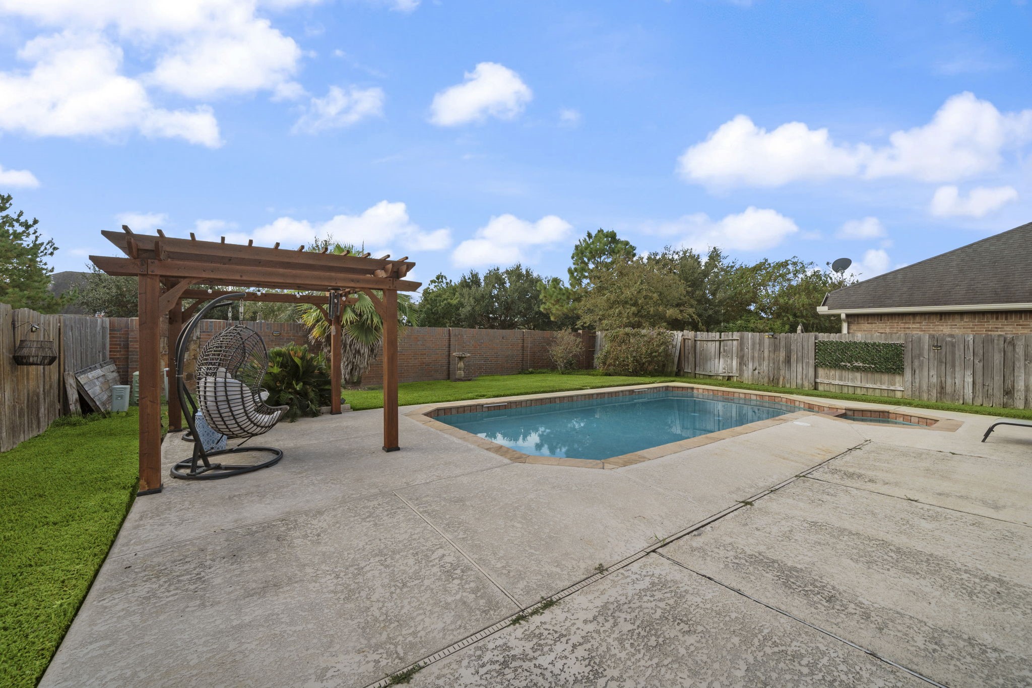 9431 Thurber Ridge Drive Spring, TX 77379 - Photo 37 of 44 Summers in the pool are great, but winters with a spa are even better!