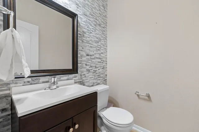 a bathroom with a sink and a toilet