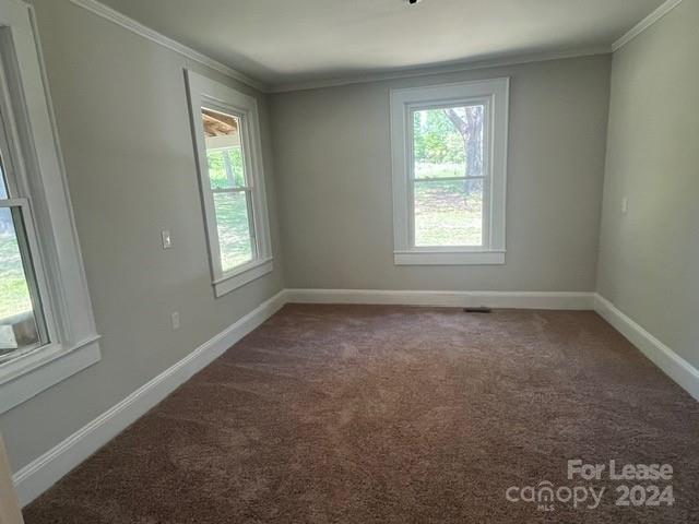 13551 Barberry Avenue Midland, NC 28107 - Photo 14 of 23 an empty room with a window
