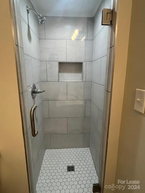 13551 Barberry Avenue Midland, NC 28107 - Photo 16 of 23 a bathroom with a shower