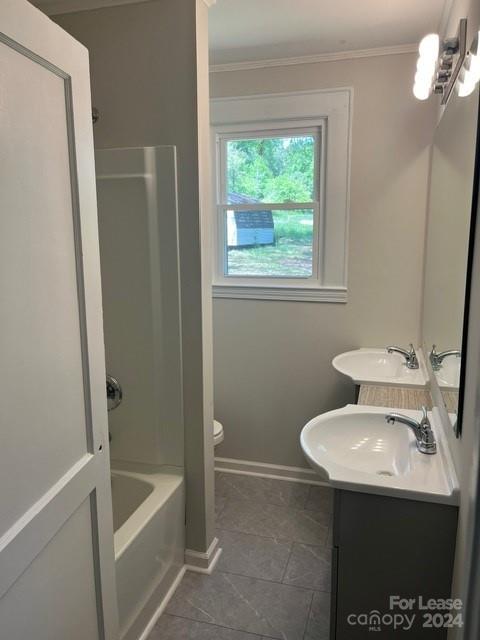 13551 Barberry Avenue Midland, NC 28107 - Photo 19 of 23 a bathroom with a sink a bathtub and a toilet