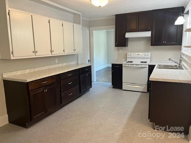 13551 Barberry Avenue Midland, NC 28107 - Photo 7 of 23 a kitchen with stainless steel appliances granite countertop a stove a sink and a microwave