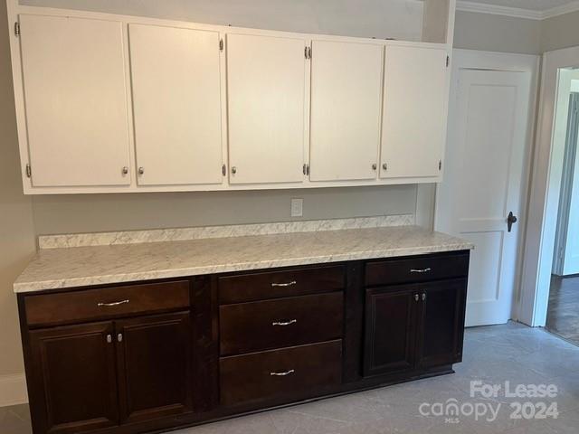 13551 Barberry Avenue Midland, NC 28107 - Photo 9 of 23 a view of cabinets with granite countertop
