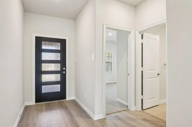 a view of an empty room and window