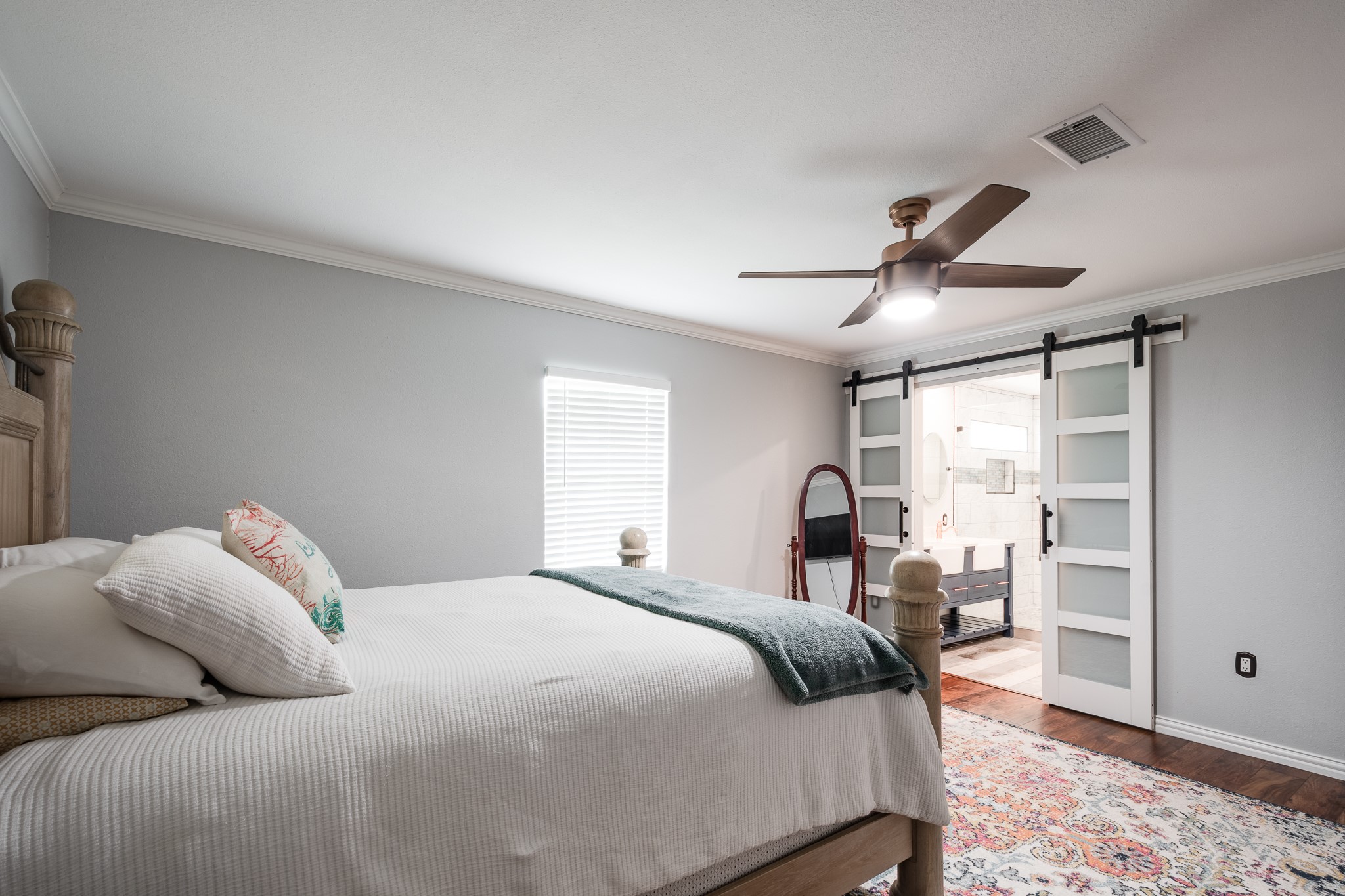 11620 Fostoria Road Cleveland, TX 77328 - Photo 15 of 26 a bedroom with a bed and a walk in closet