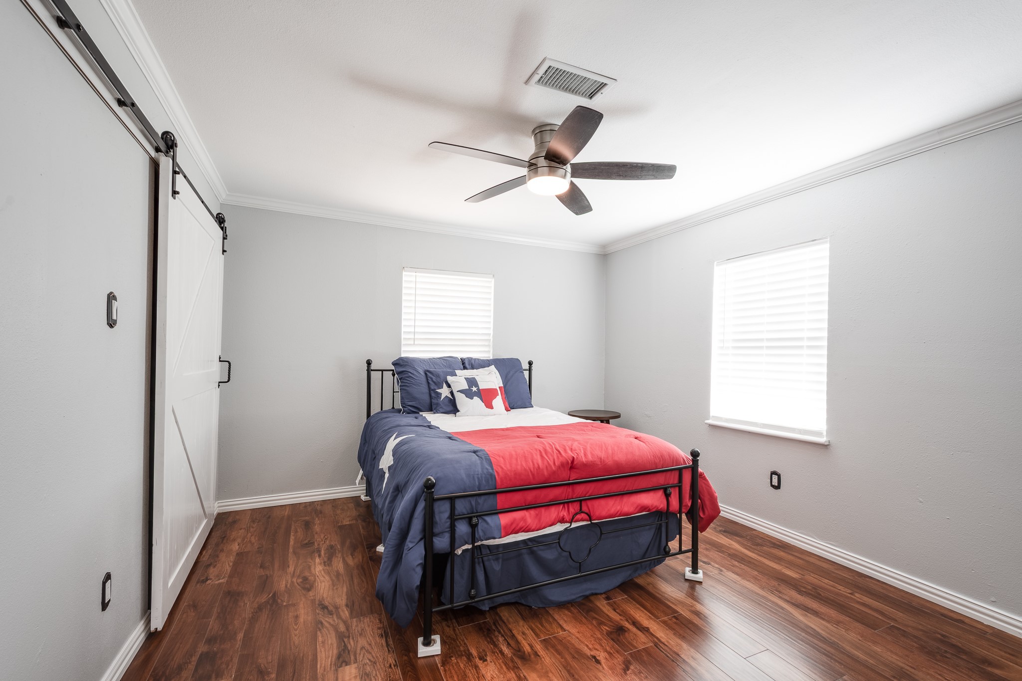11620 Fostoria Road Cleveland, TX 77328 - Photo 17 of 26 a bedroom with a bed and a window