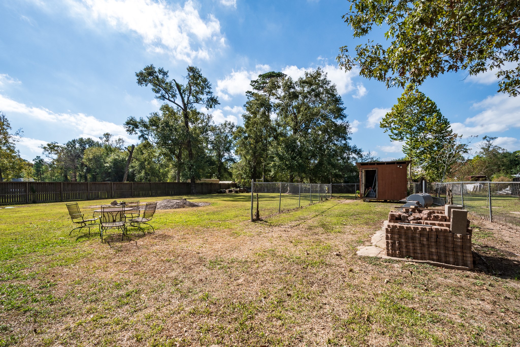 11620 Fostoria Road Cleveland, TX 77328 - Photo 20 of 26 a view of a house with pool