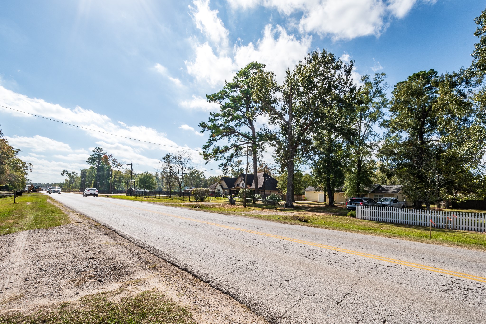 11620 Fostoria Road Cleveland, TX 77328 - Photo 22 of 26 a view of a swimming pool with an outdoor space and seating area