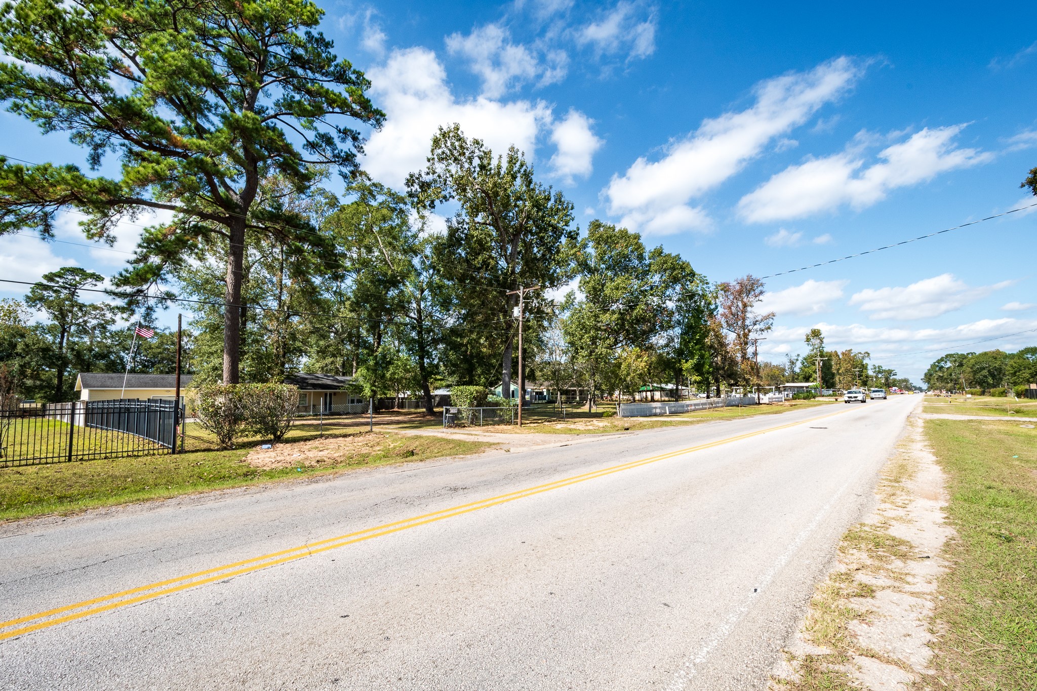 11620 Fostoria Road Cleveland, TX 77328 - Photo 23 of 26 a view of a swimming pool with an outdoor seating