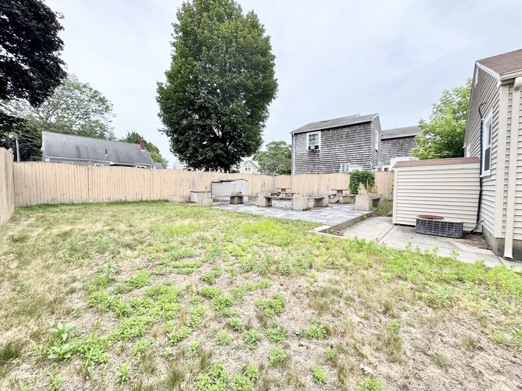 7 Roland Road Peabody, MA 01960 - Photo 22 of 24 a house view with a sitting space and garden