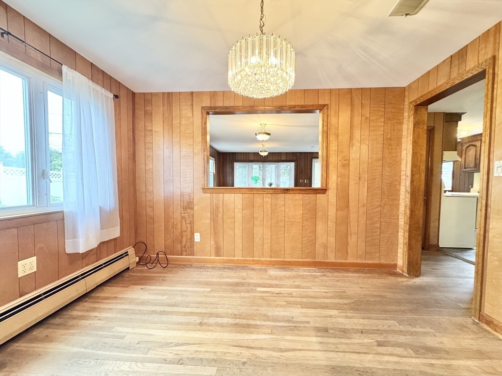 7 Roland Road Peabody, MA 01960 - Photo 6 of 24 a view of a room with wooden floor and windows