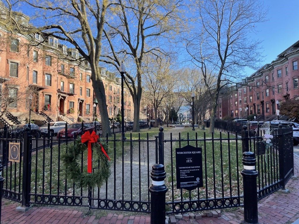 28 Worcester Square, Unit 4 Boston, MA 02118 - Photo 7 of 7 a view of street with wooden fence