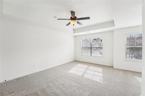 a view of a room with wooden walls
