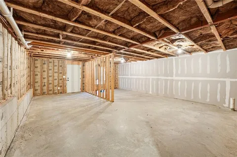 view of balcony with furniture and trees