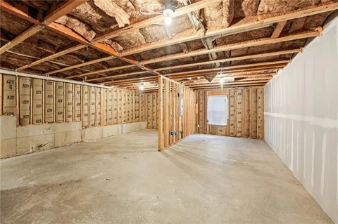 a view of a chairs and table in a patio