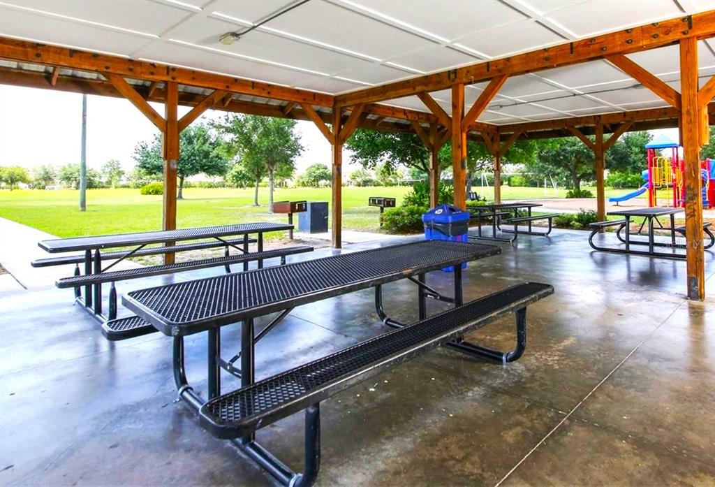 14163 Cattle Egret PIace Lakewood Ranch, FL 34202 - Photo 39 of 50 a view of a swimming pool with a patio