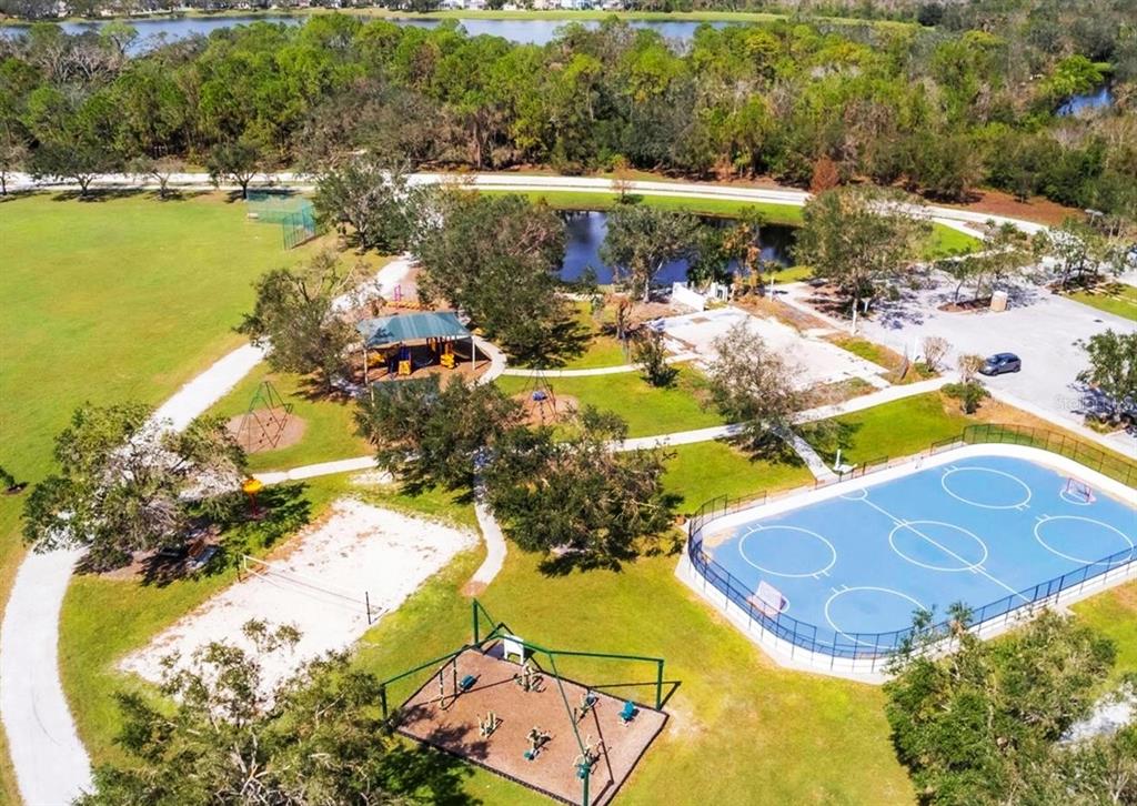 14163 Cattle Egret PIace Lakewood Ranch, FL 34202 - Photo 42 of 50 an aerial view of residential houses with outdoor space