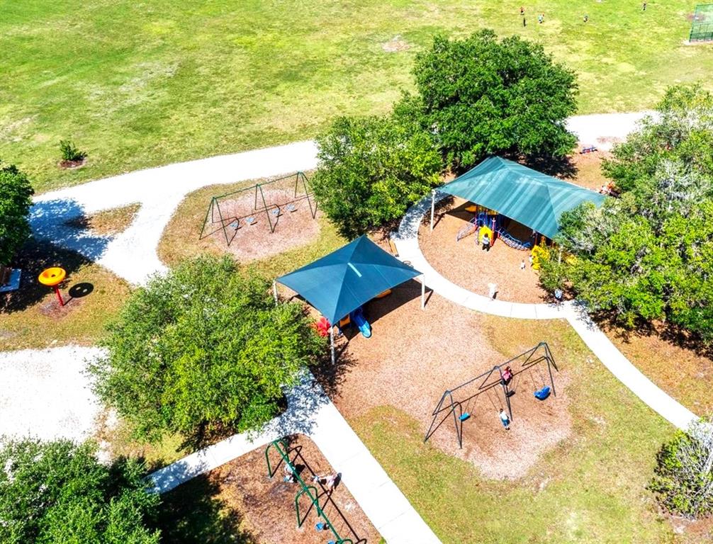 14163 Cattle Egret PIace Lakewood Ranch, FL 34202 - Photo 44 of 50 an aerial view of a house with a swimming pool
