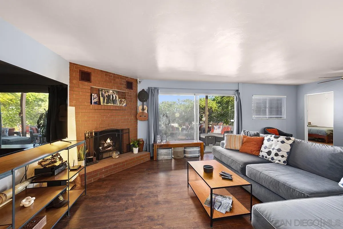 4310 Resmar Road La Mesa, CA 91941 - Photo 11 of 70 a living room with furniture and a fireplace