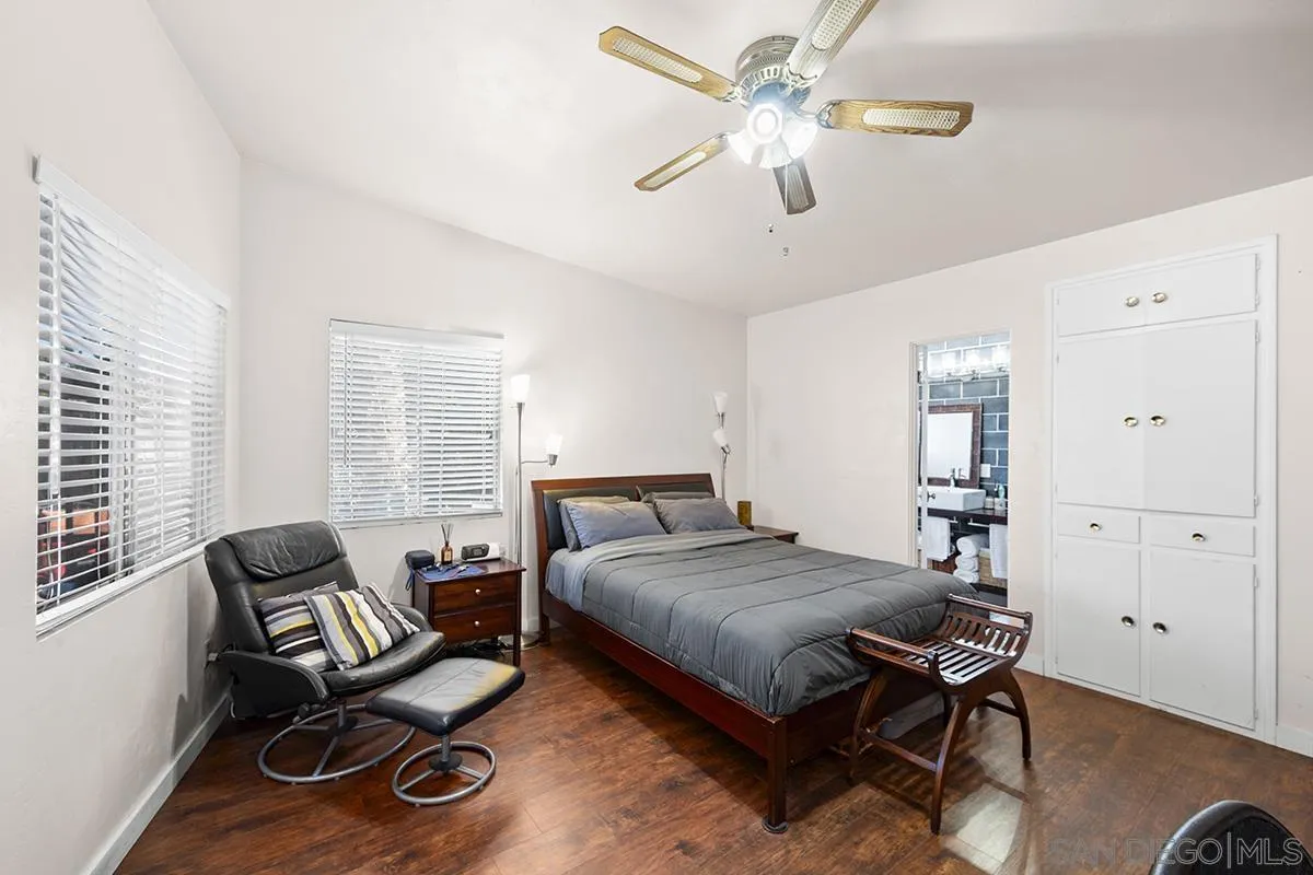 4310 Resmar Road La Mesa, CA 91941 - Photo 25 of 70 a bedroom with a bed and a chandelier