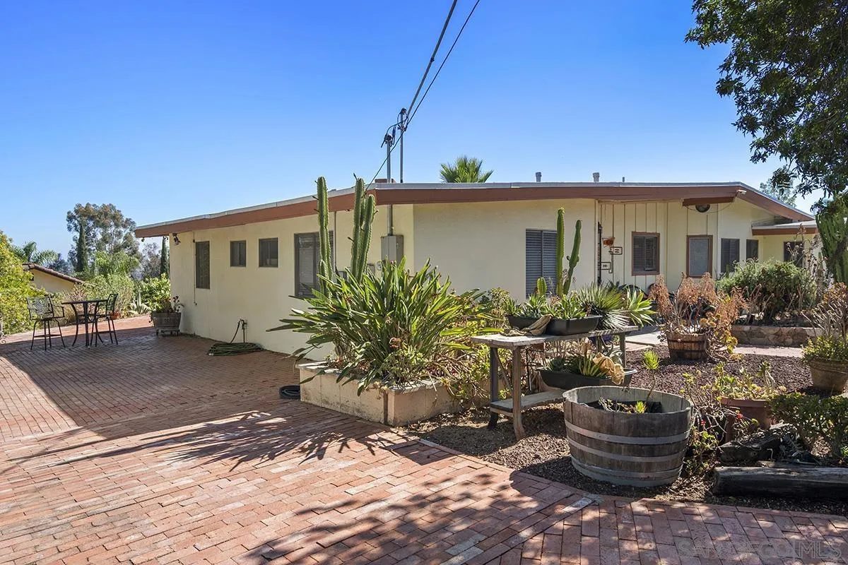 4310 Resmar Road La Mesa, CA 91941 - Photo 6 of 70 a view of a house with backyard sitting area and garden