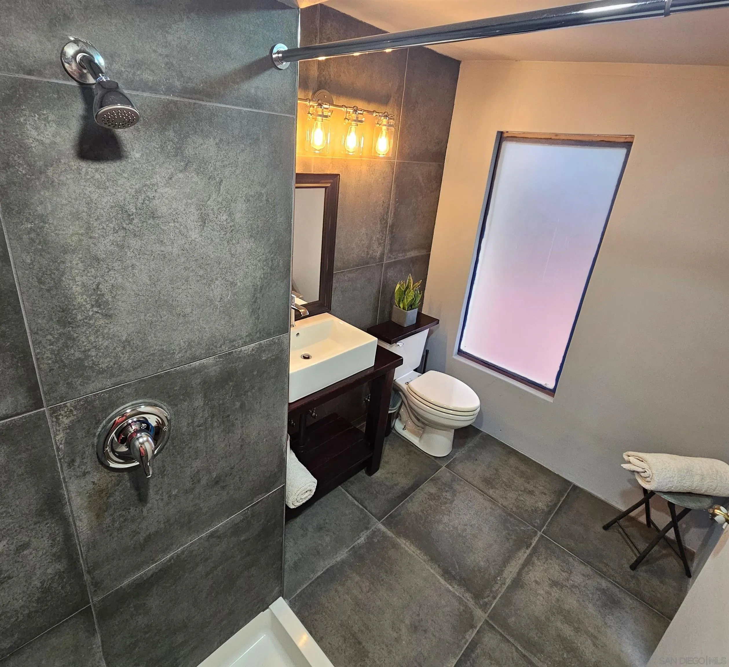 4310 Resmar Road La Mesa, CA 91941 - Photo 68 of 70 a bathroom with a sink and a toilet