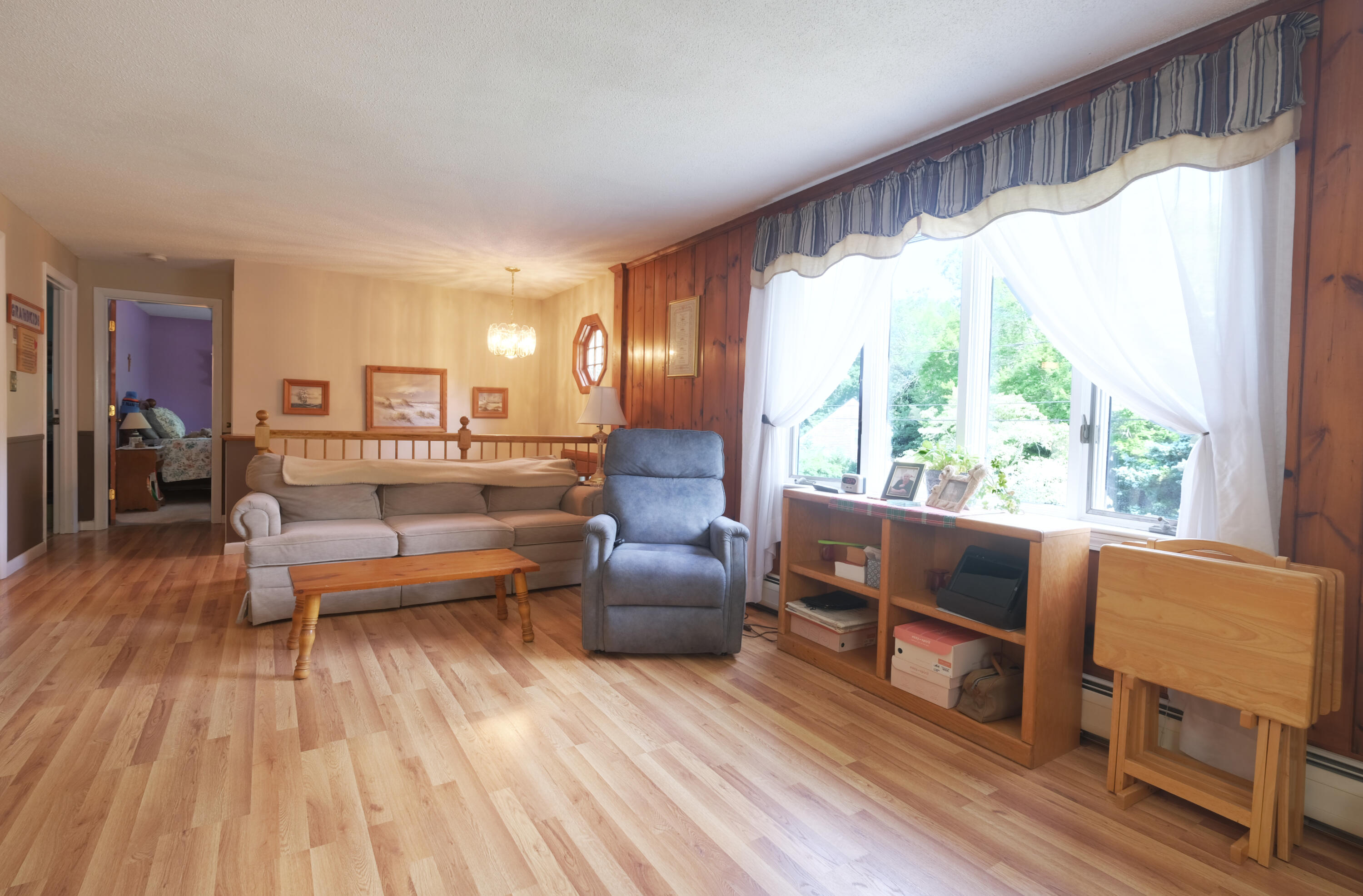 103 Moco Road West Barnstable, MA 02668 - Photo 18 of 47 a living room with furniture and a large window