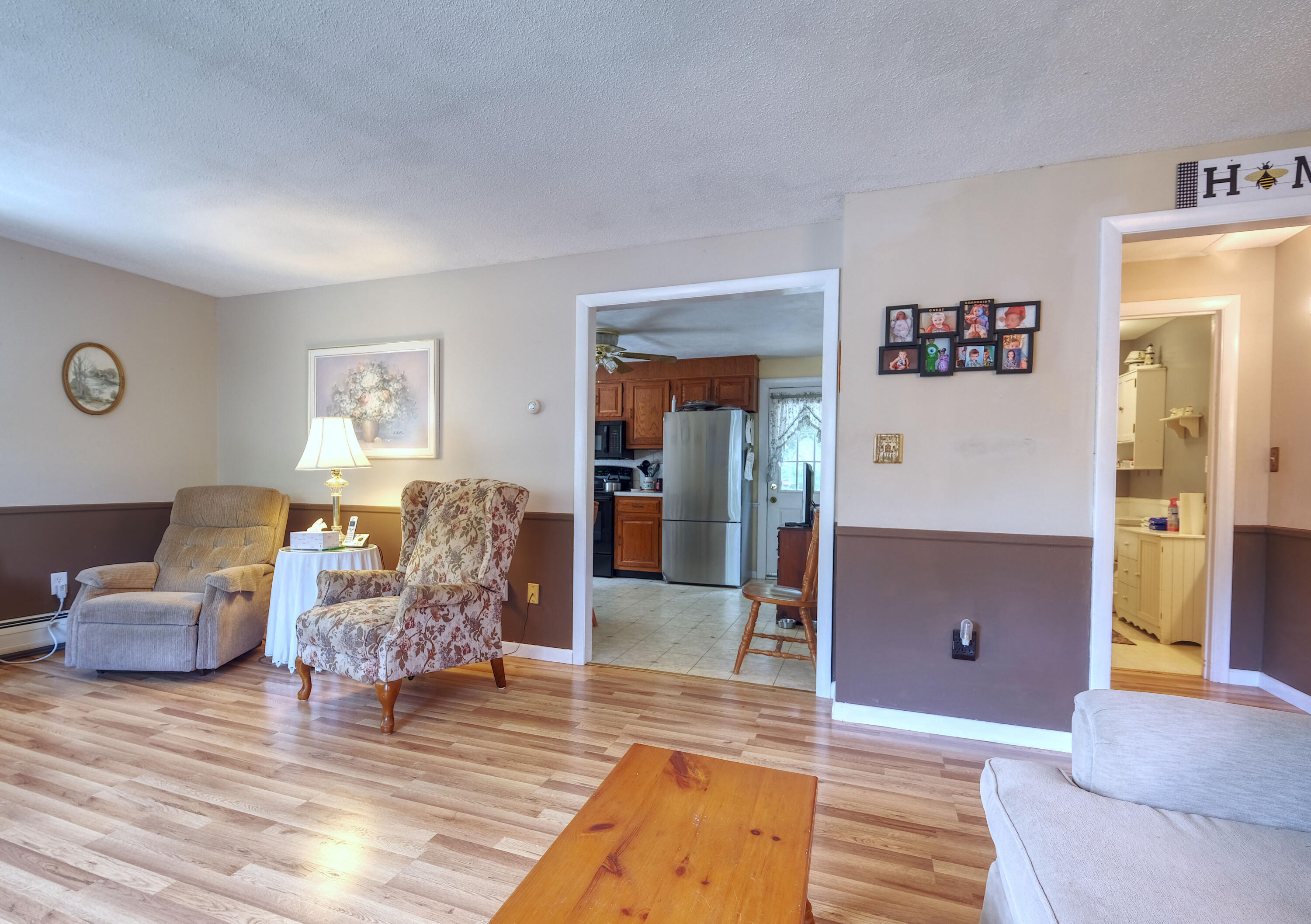 103 Moco Road West Barnstable, MA 02668 - Photo 22 of 47 a living room with furniture and a wooden floor