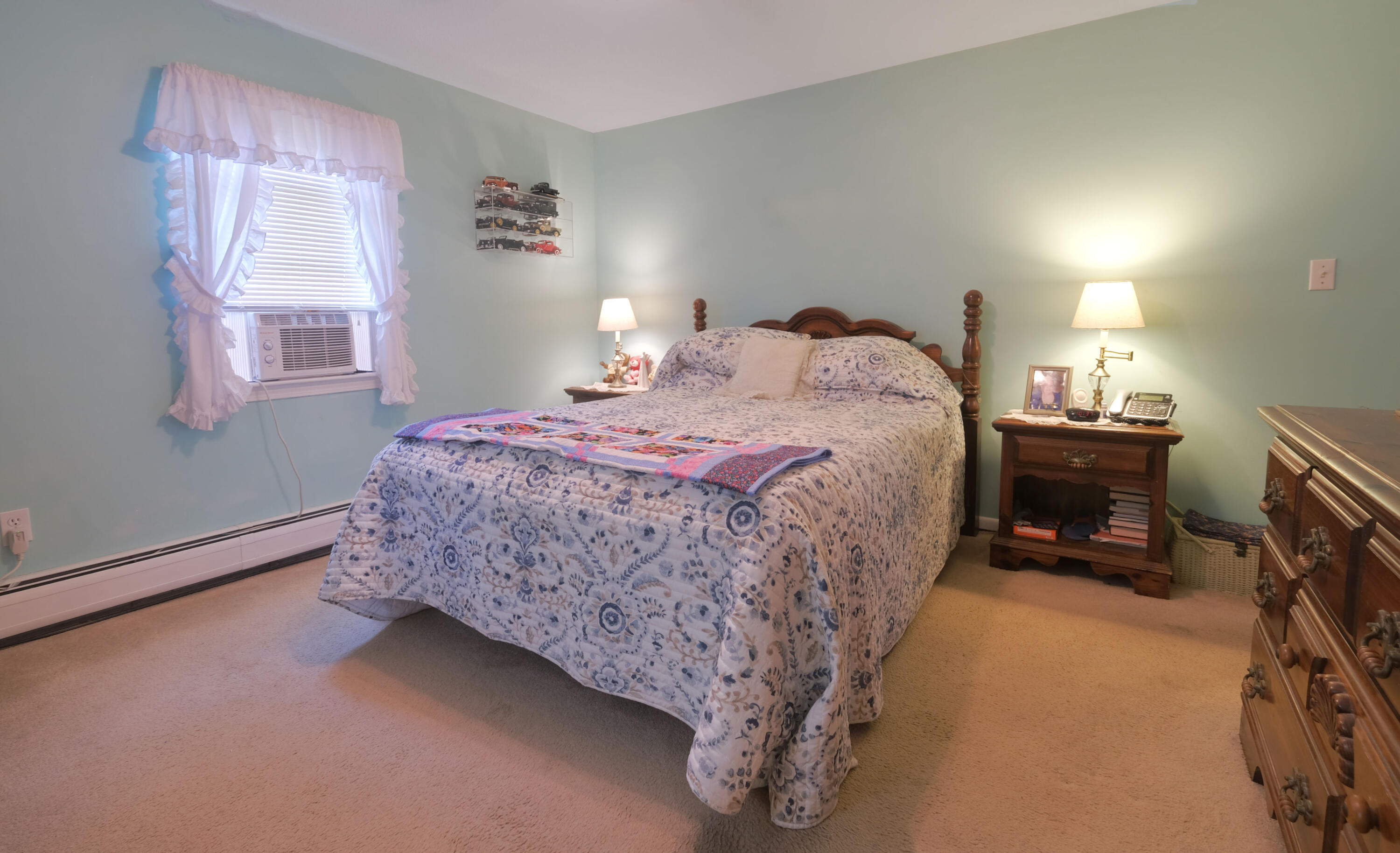 103 Moco Road West Barnstable, MA 02668 - Photo 30 of 47 a bedroom with a bed and a lamp