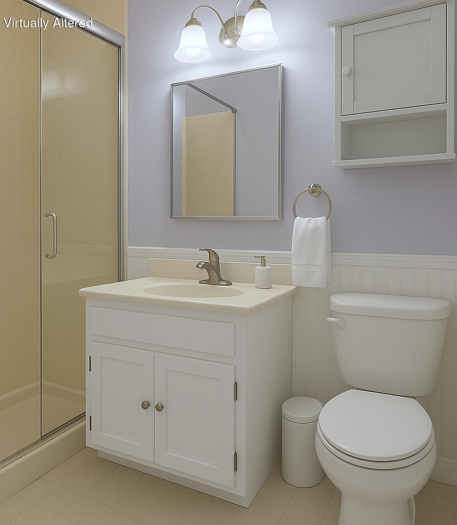 103 Moco Road West Barnstable, MA 02668 - Photo 34 of 47 a bathroom with a toilet sink and mirror
