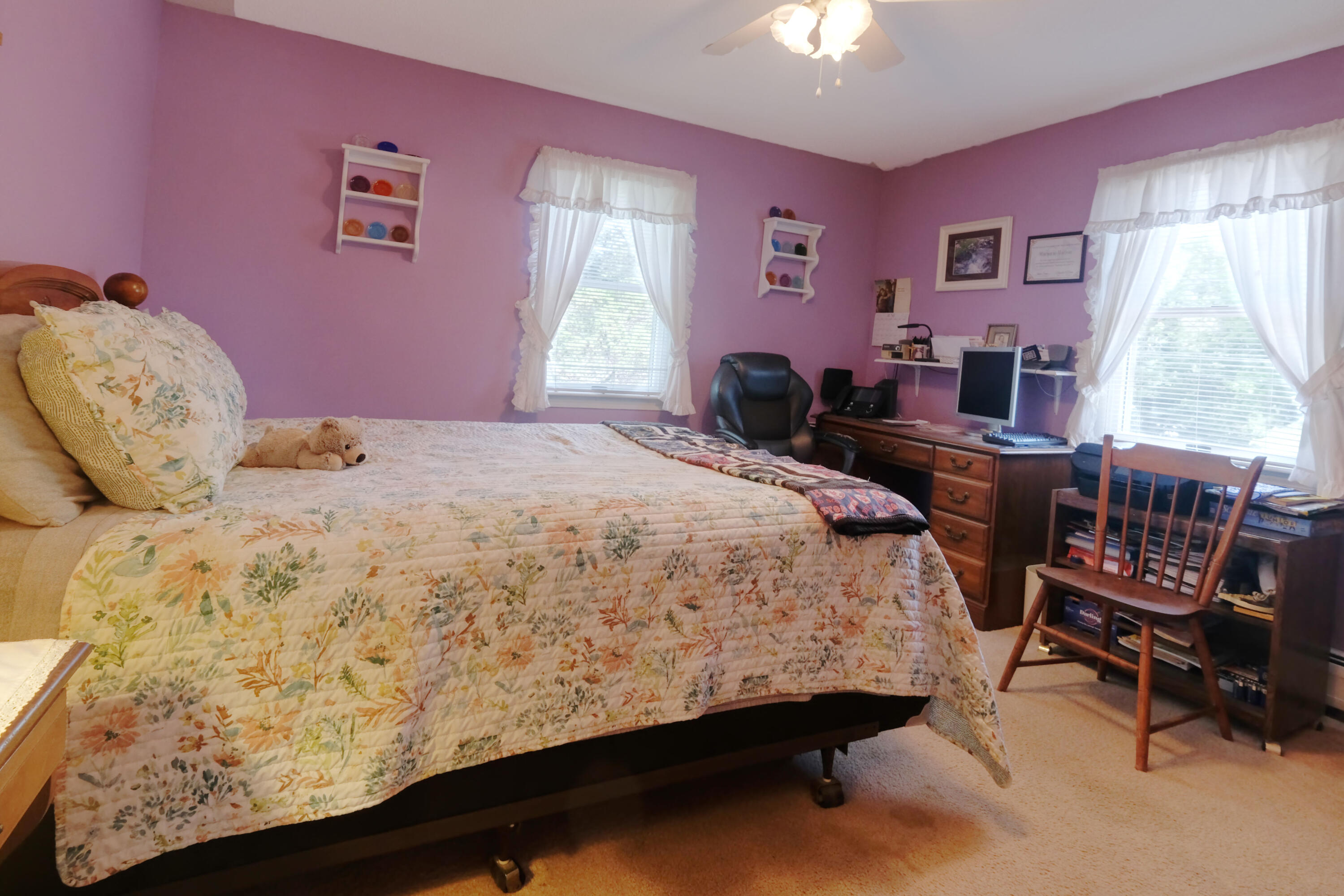 103 Moco Road West Barnstable, MA 02668 - Photo 35 of 47 a bedroom with a bed a chair and a large window