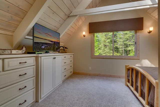 a kitchen with a cabinets and a window