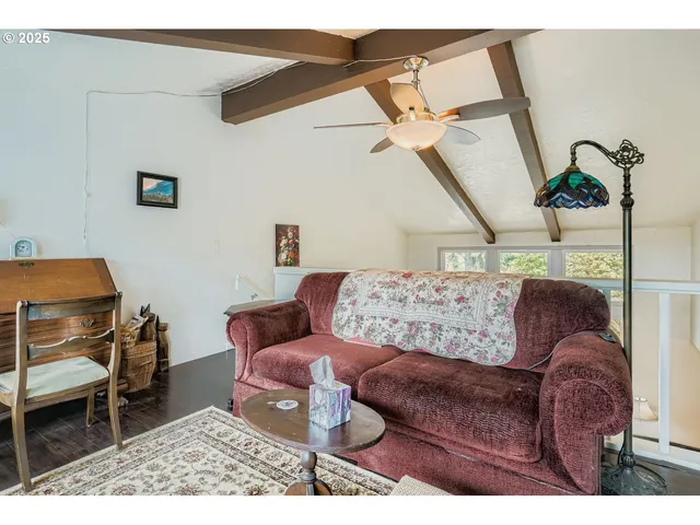 a living room with furniture and a couch