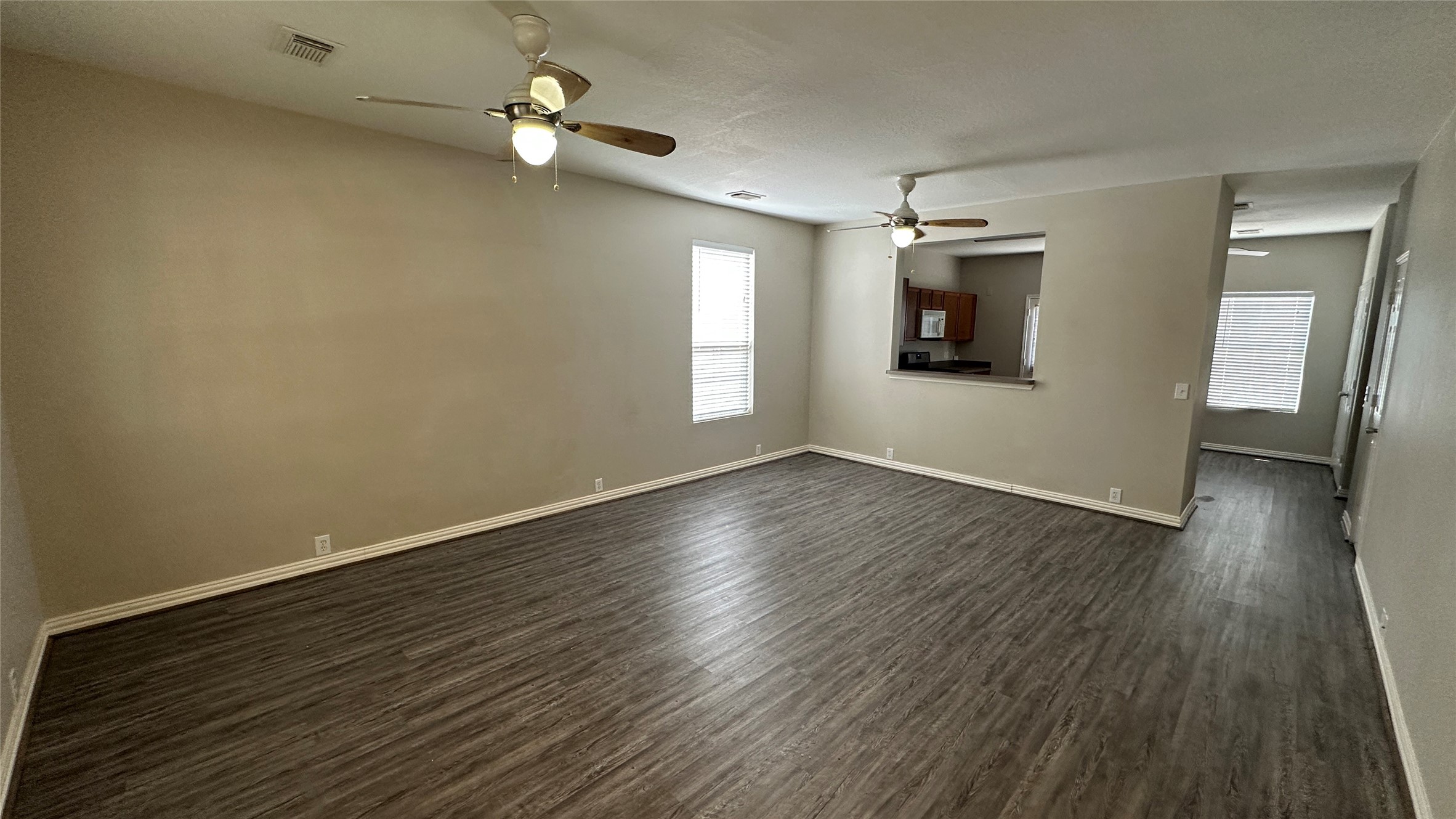 23851 Single Oak Street Spring, TX 77373 - Photo 3 of 15 wooden floor in an empty room with a window