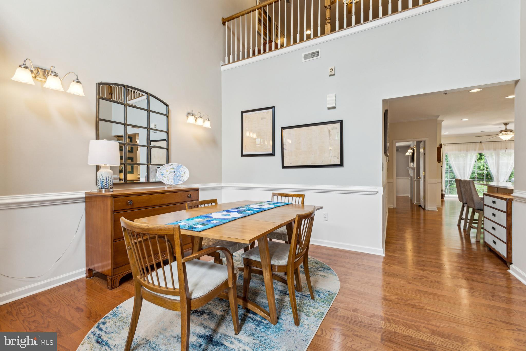633 Ruxton Road, Unit 75 Solomons, MD 20629 - Photo 15 of 43 a dining room with furniture and wooden floor