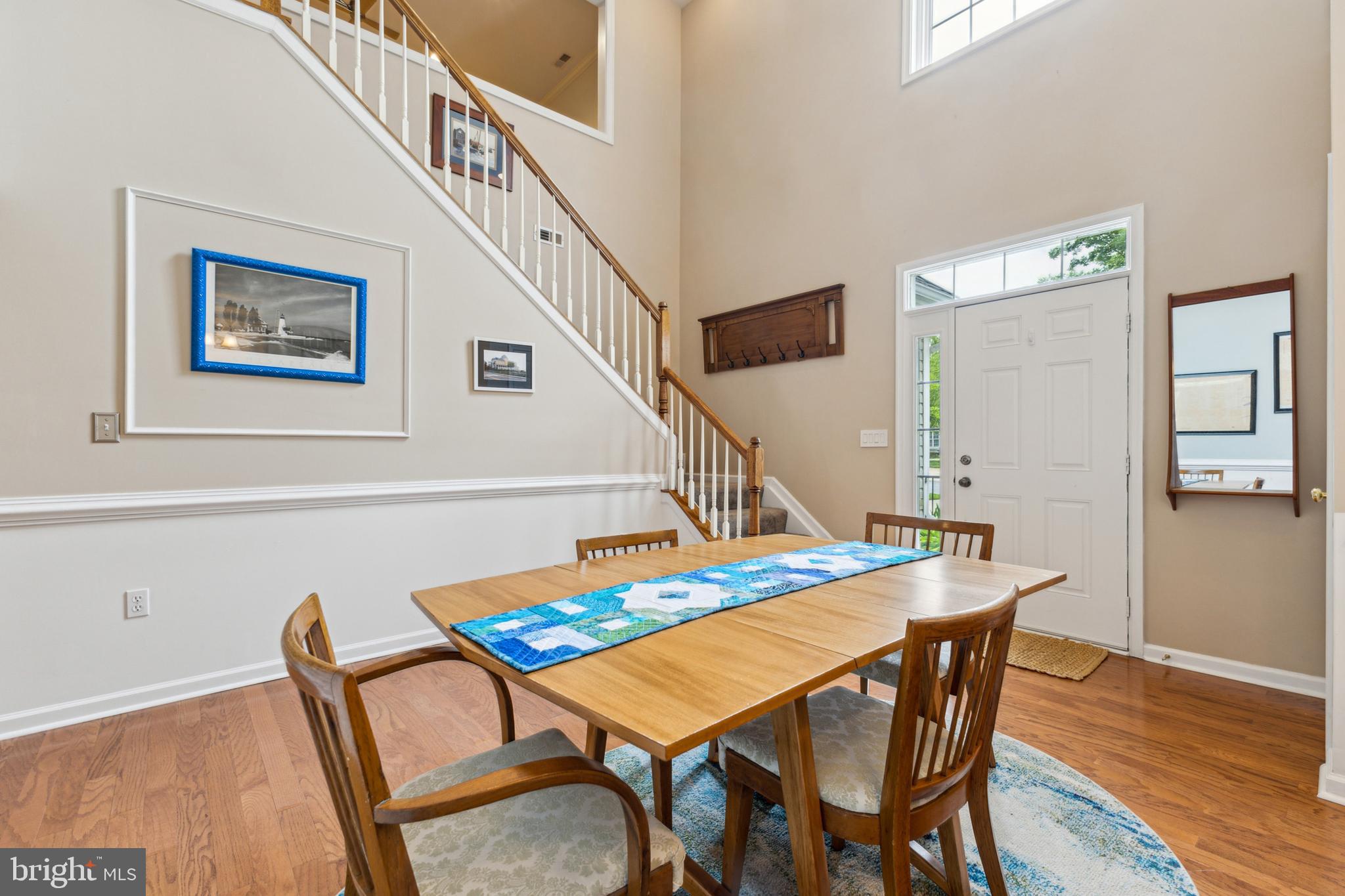 633 Ruxton Road, Unit 75 Solomons, MD 20629 - Photo 16 of 43 a view of a dining room with furniture and wooden floor