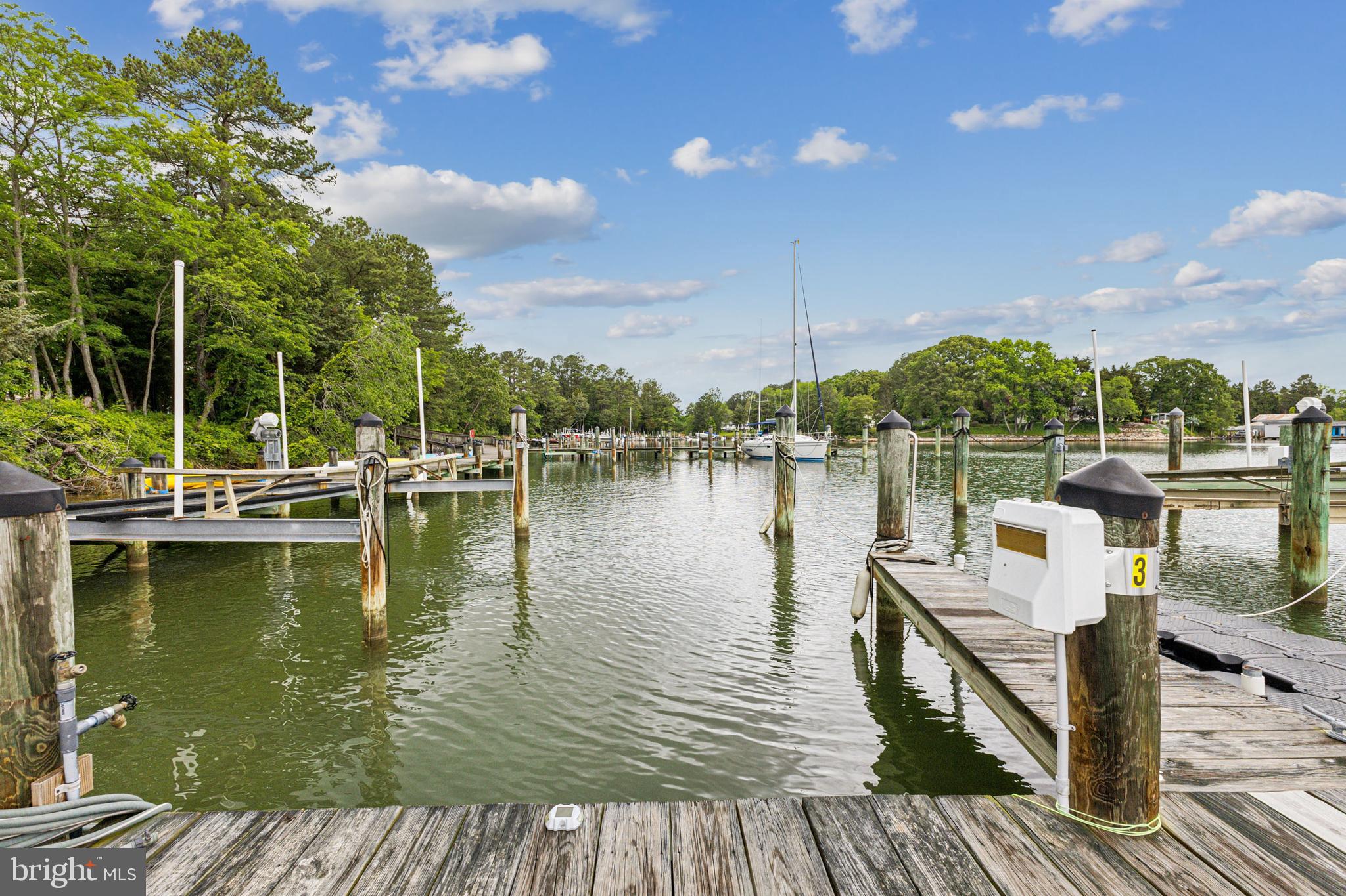 633 Ruxton Road, Unit 75 Solomons, MD 20629 - Photo 2 of 43 a view of a lake with couches and city view