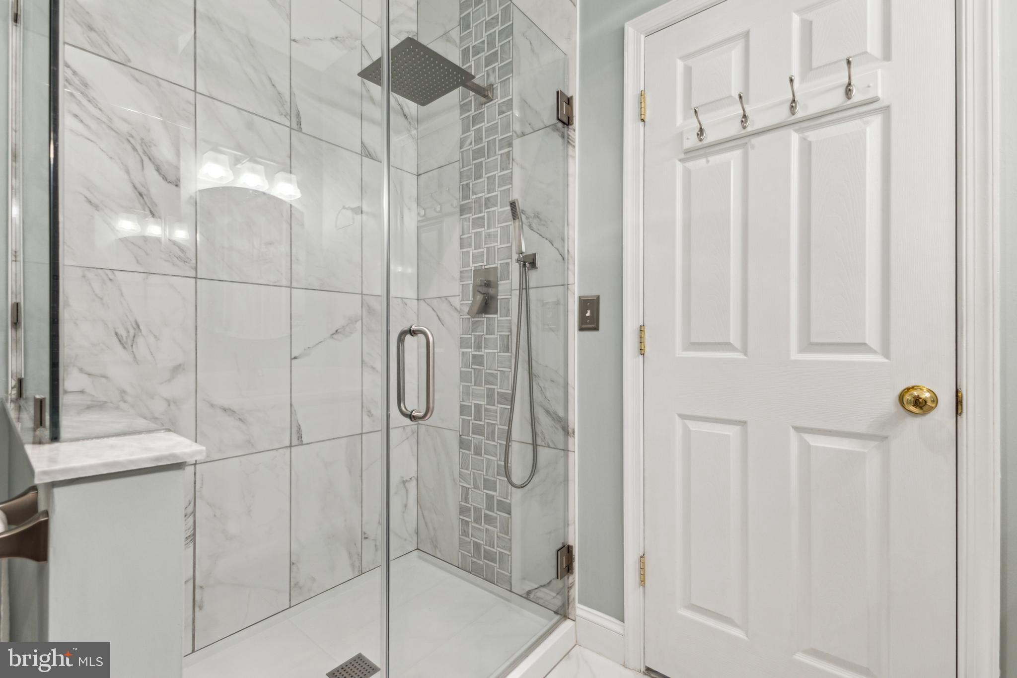 633 Ruxton Road, Unit 75 Solomons, MD 20629 - Photo 23 of 43 a bathroom with a shower