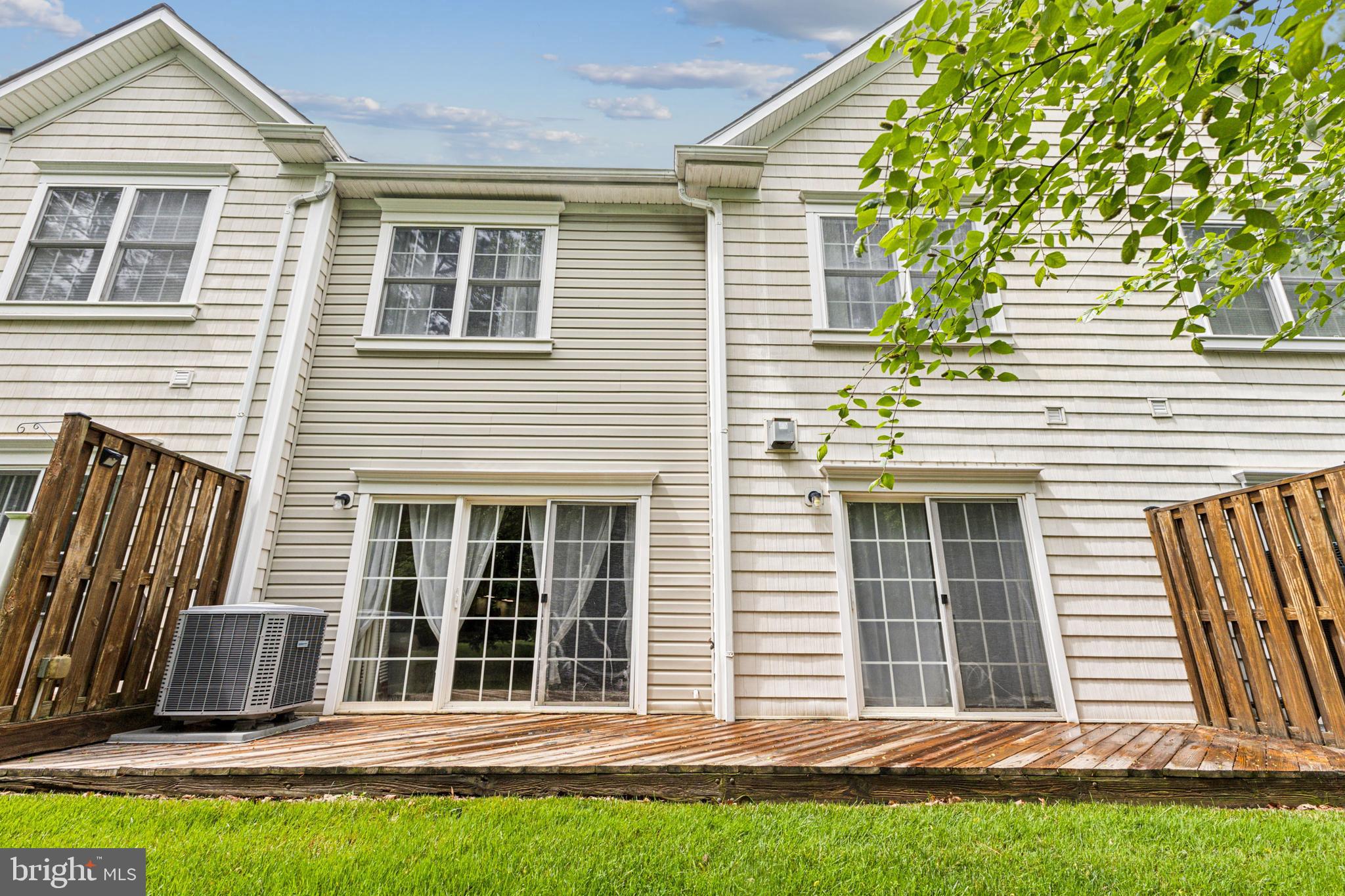633 Ruxton Road, Unit 75 Solomons, MD 20629 - Photo 40 of 43 a front view of a house with a garden