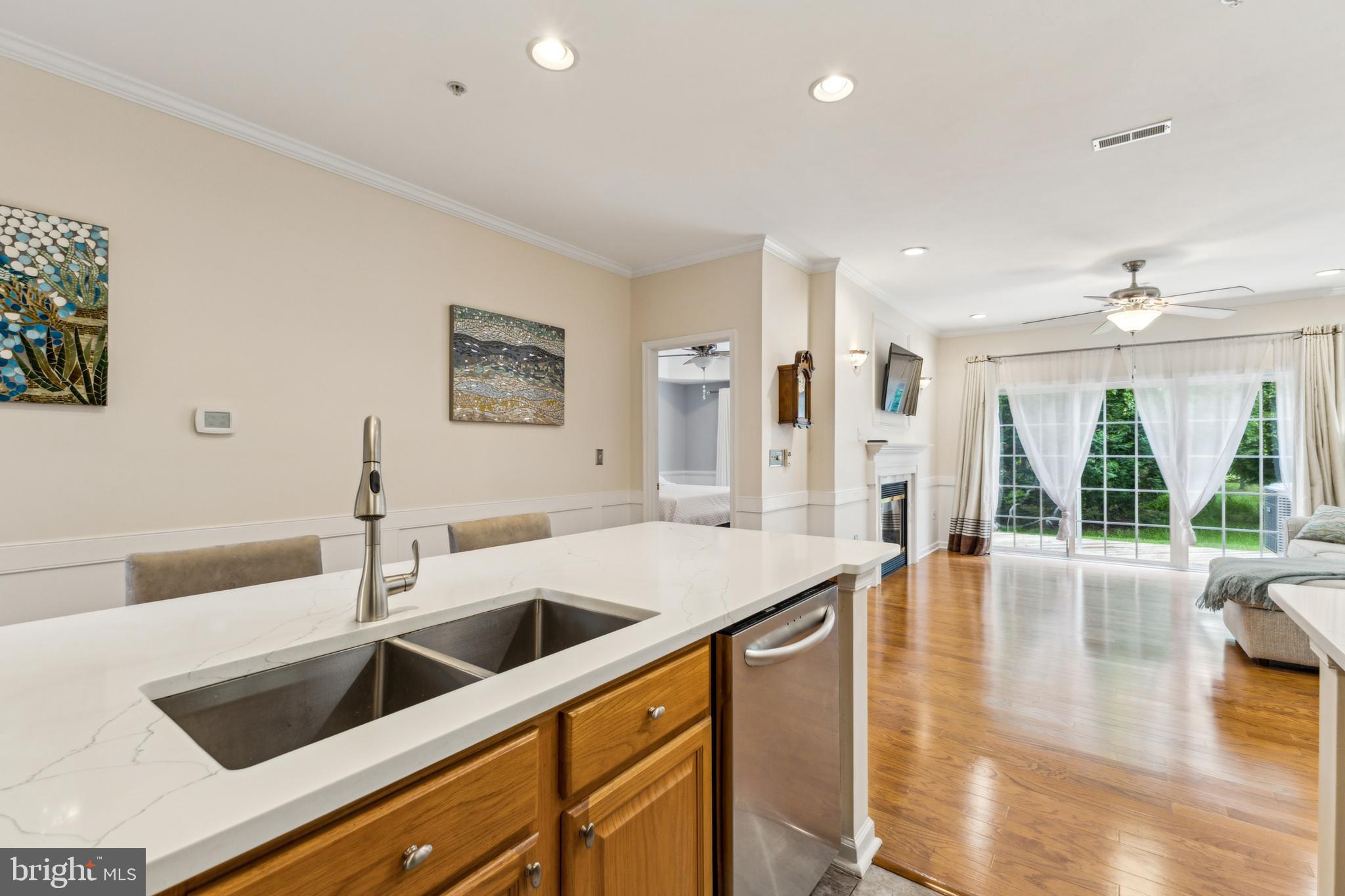 633 Ruxton Road, Unit 75 Solomons, MD 20629 - Photo 7 of 43 a kitchen with a sink and large window