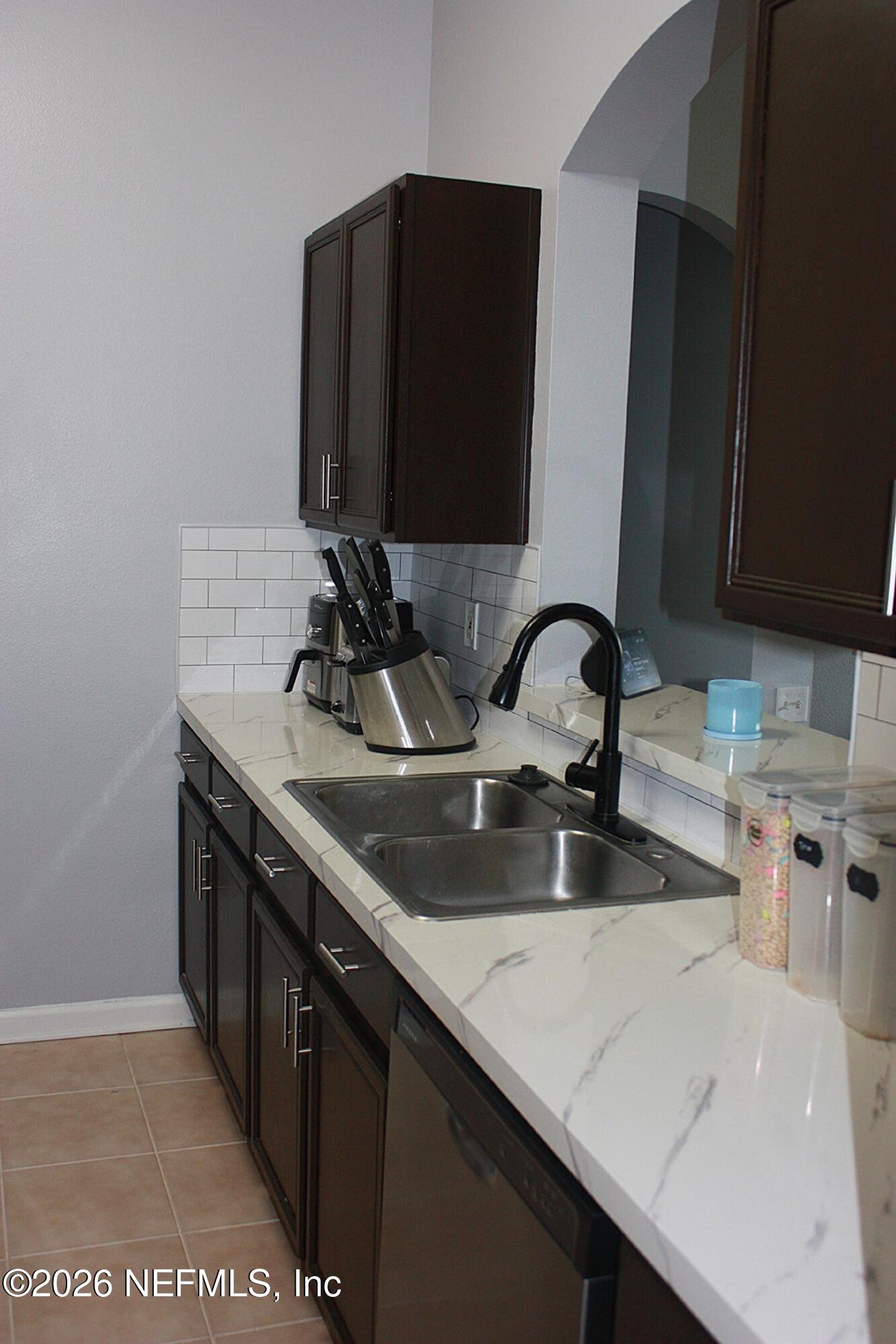 7990 Baymeadows Road East, Unit 530 Jacksonville, FL 32256 - Photo 1 of 21 a close view of two sink and a vanity in a bathroom