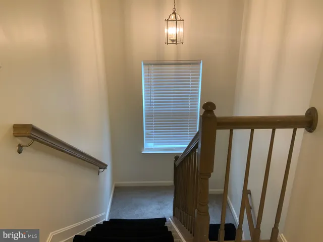 a view of a hallway with entryway