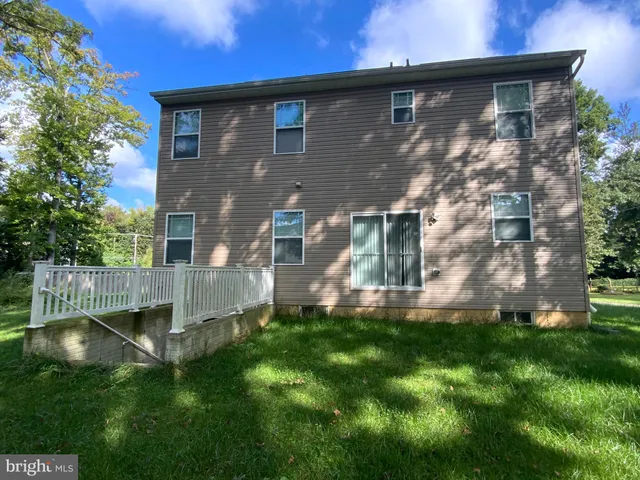 a front view of house with yard